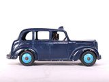 a toy car that is sitting on a white surface