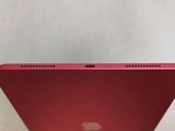 an apple laptop computer sitting on top of a white table