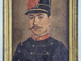 portrait of a man in a military uniform in a gold frame