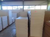 many stacks of boxes in a warehouse with a lot of them