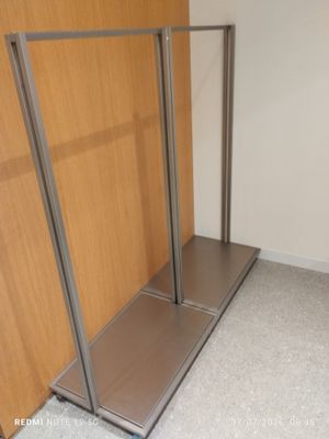 a picture of a bathroom with a toilet and a shower stall