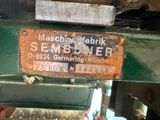 a picture of a sign on a machine in a factory
