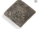 an image of a bronze plaque depicting a group of people in a field