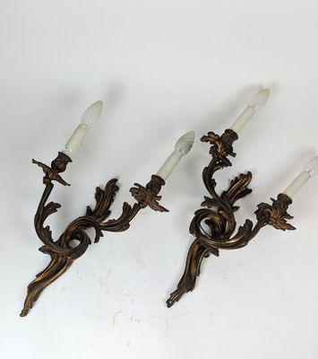 paire d'appliques murales anciennes en forme d'oiseau