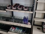a lot of makeup products on the shelves in the store