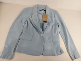 the jacket is blue and has a white tag on it