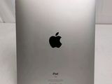 the back of an apple ipad with an apple logo on it
