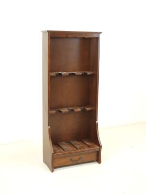 an image of a wooden wine rack in a white room