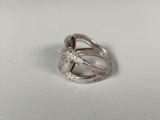 sterling silver ring with diamond accents on a white surface