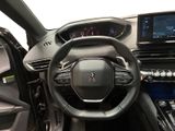 the interior of a car with a steering wheel, dashboard, and dash board