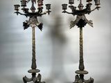pair of antique brass candelabs with birds and flowers on them
