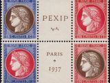 a close up of a stamp with four different faces on it