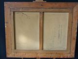 an old wooden easel with a piece of paper on top of it