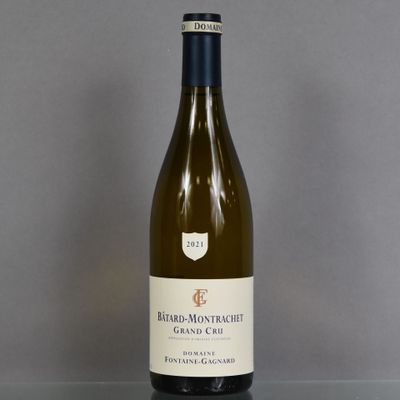 a bottle of wine that is sitting on a table
