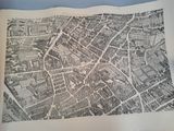 an old map of a city with lots of buildings on it