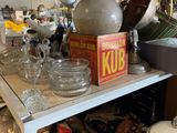 a table with a lot of dishes and bowls on it
