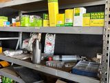 many shelves with various items on them in a store
