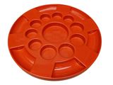 an orange plastic plate with a circular design on it