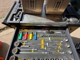 a tool tray with a variety of tools in it