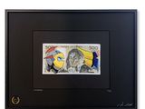 framed picture of a picture of a man and a woman on a bank note