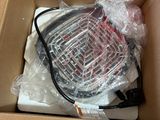 a box with a tennis racquet inside of it