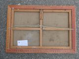 a picture of an old window with a rope on it