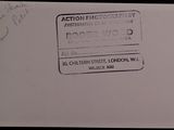 an envelope with a picture of a person holding a cell phone
