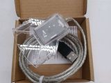 a box that has a cable and a charger inside of it