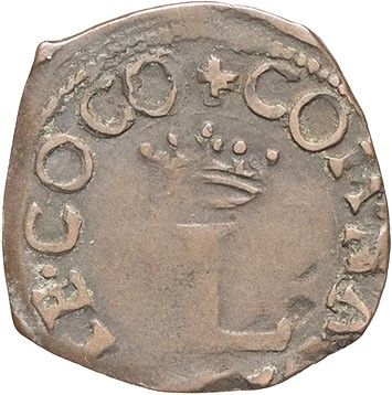 a silver coin with a crown on top of it