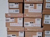 several boxes stacked on top of each other on a table