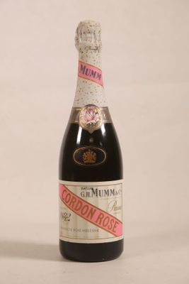 a bottle of wine that is sitting on a table