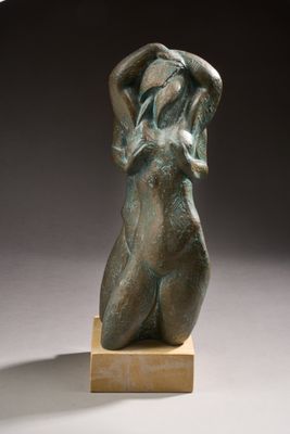 bronze sculpture of a woman holding her head in her hands