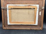 an old wooden frame with a picture hanging on it