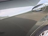 a close up of a car ' s door handle and door handle