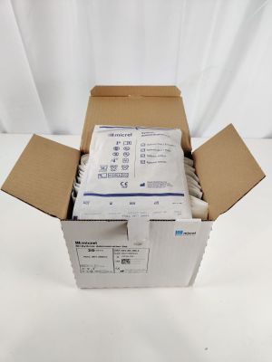 an open box of medical supplies sitting on top of a white surface