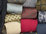 many different types of ties in a box together
