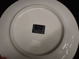 a white plate with a black and white label on it