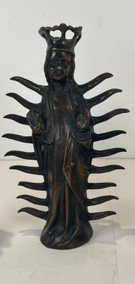 two statues of a woman with a crown on her head