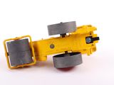 a close up of a yellow toy truck with wheels