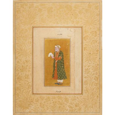 un tableau représentant une femme en robe verte tenant une fleur