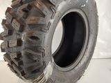 a close up of a tire on a white surface with a white background