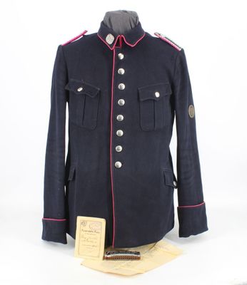 a blue uniform with red pips and buttons on a mannequin mannequin mannequin mannequin mannequin mannequin mannequin