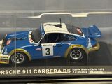 a blue and white car in a clear display case