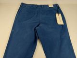 a close up of a pair of blue jeans on a table
