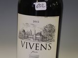 a bottle of wine that is sitting on a table