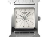 a silver watch with a white face on a silver bracelet