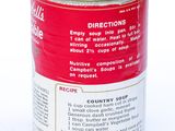 a can of soup that is sitting on a table