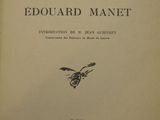 an old book with a black and white image of a bee on it