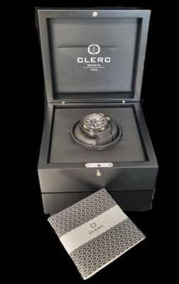 a close up of a box with a watch inside of it