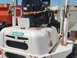 an image of a forklift parked in a parking lot